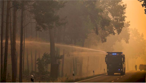 Wildfire explodes WWII munitions near Berlin