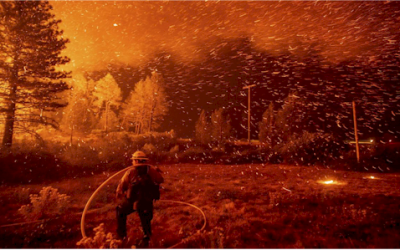 Wildfire that closed key California highway explodes in size