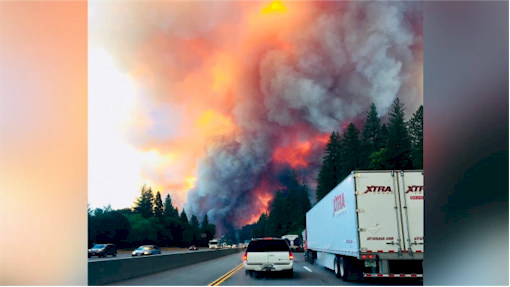 California wildfire closes major highway, prompts new evacuations